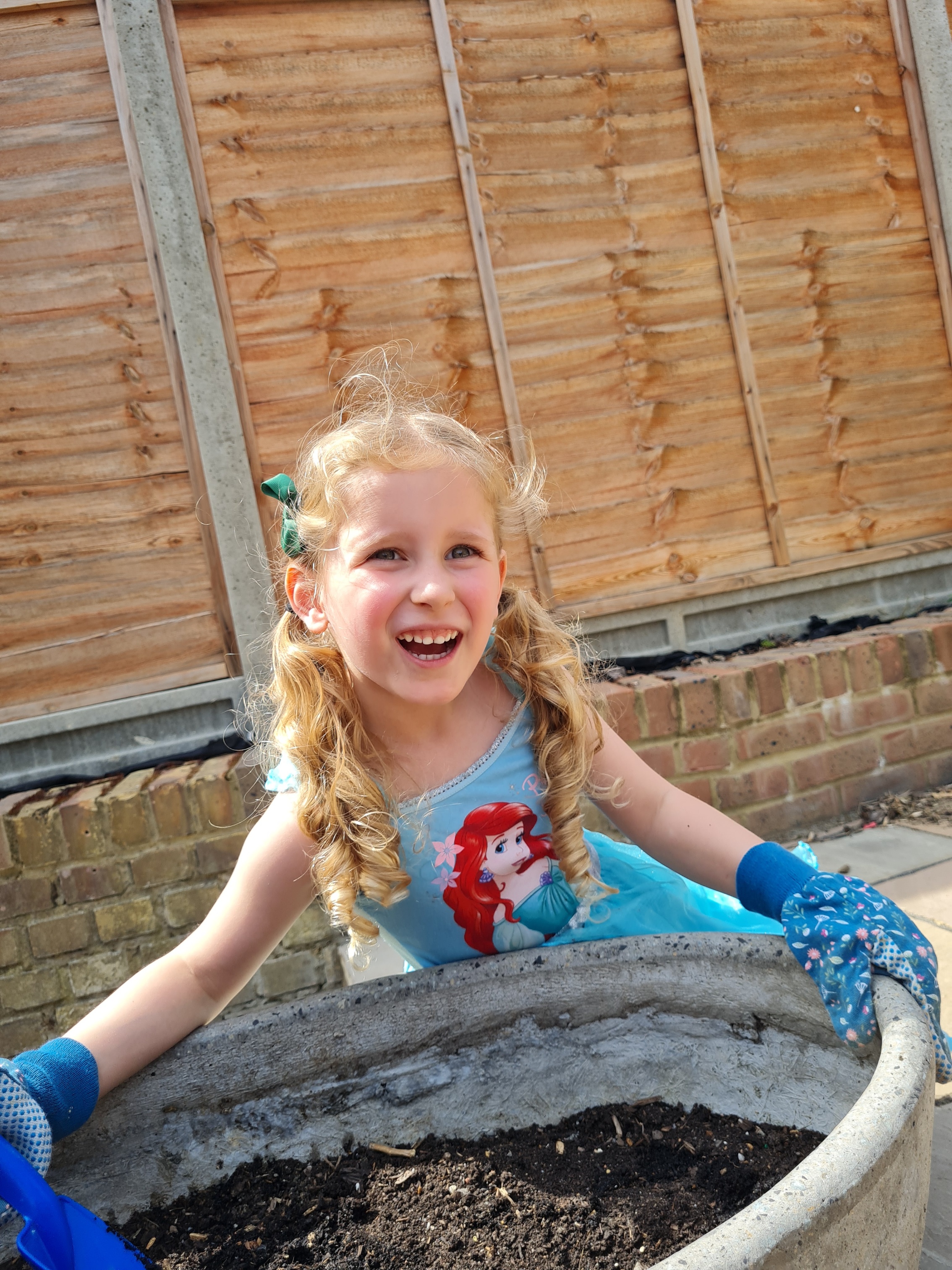 Ellena H -Mariella Rose is enjoying looking after her sunflowers! Photos of our journey enclosed